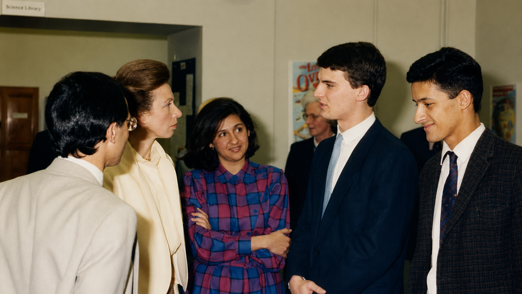 Princess Anne speaking with students during a visit to the London School of Economics